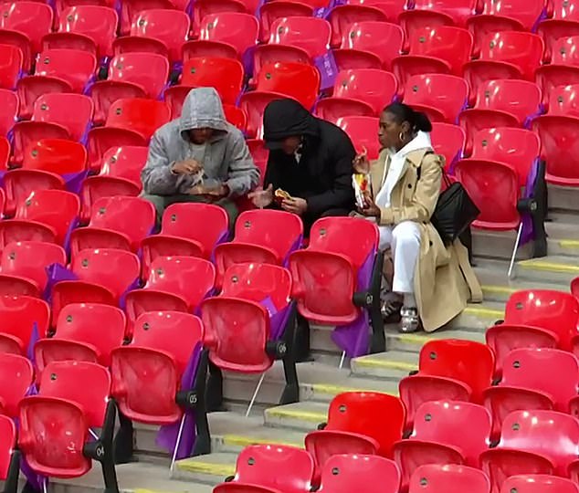 Pictured: Jude's mother Denise, father Mark and brother Jobe arrived at Wembley five hours early for the Champions League Final, having some crisps and a burger like any other fan