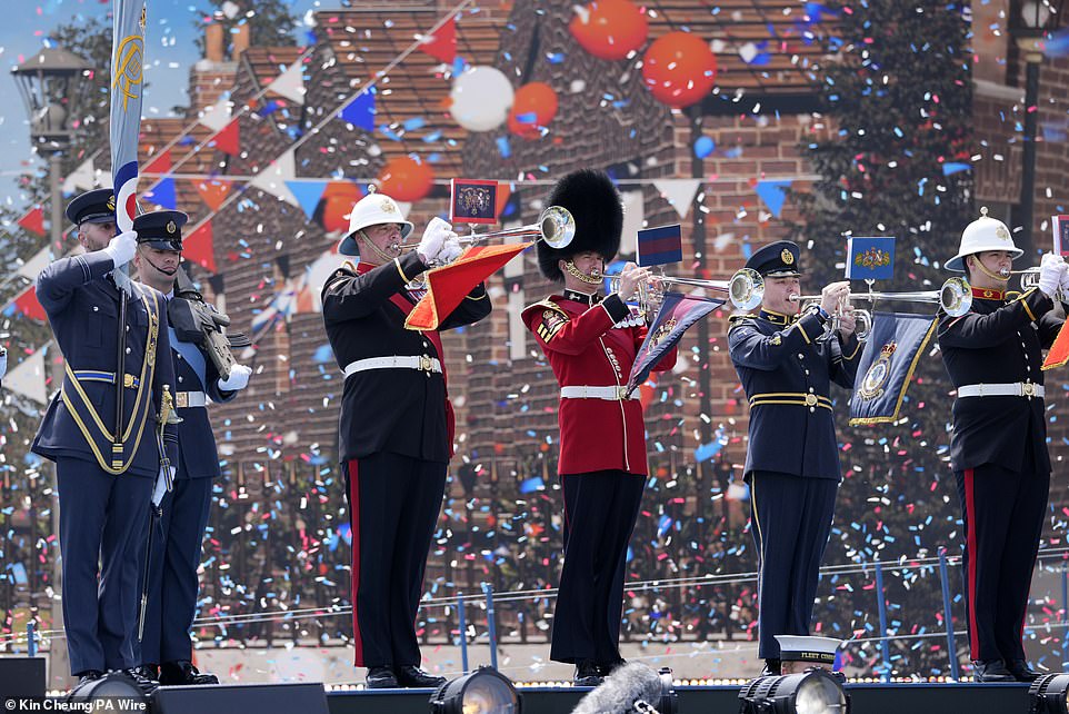 Members of the armed forces play during the UK's national commemorative event