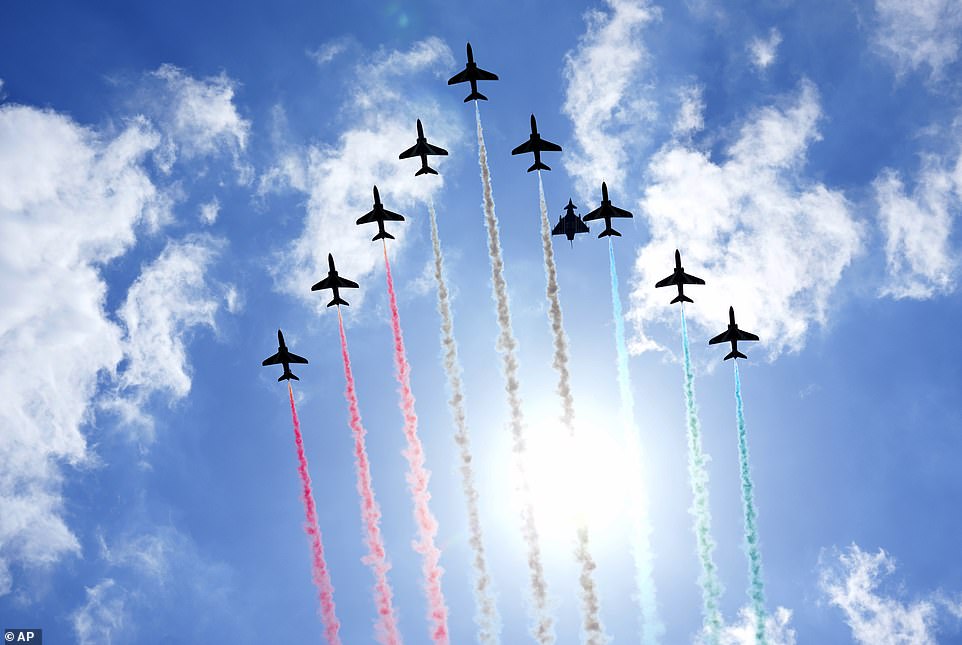 A specular Red Arrows flypast over Type 23 Frigate HMS St Albans