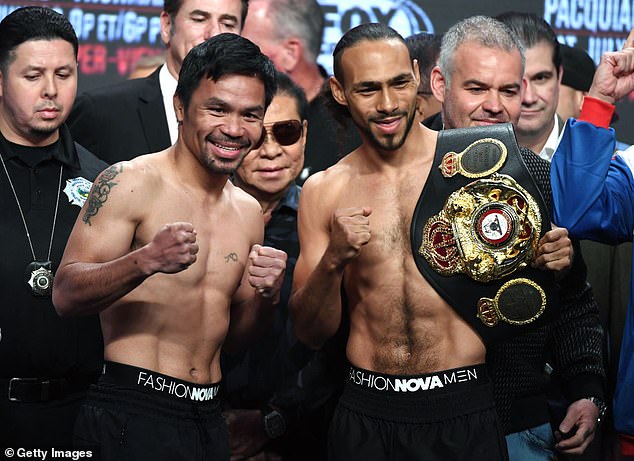 Pacquiao beat Keith Thurman (right) at the age of 40, one of only two men to have toppled Barrios