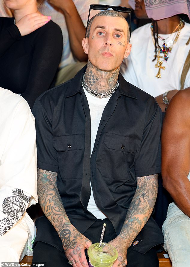 Travis Barker proudly supported his son Landon Barker at a fashion show in Los Angeles on Sunday