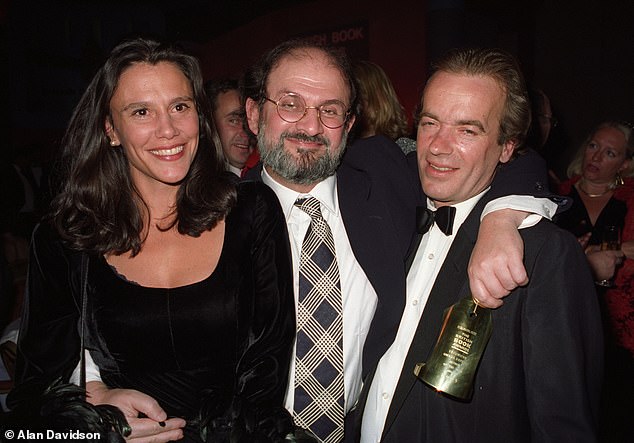 Sir Salman Rushdie, a friend and fellow novelist, did not attend but provided a written tribute.. (Martin Amis pictured at the British Book Awards in 1996 with his second wife Isabel Fonseca and writer Salman Rushdie)