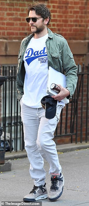 Bradley additionally wore a pair of tan-colored trousers and slipped into a pair of comfy, Air Jordan sneakers that were secured with laces