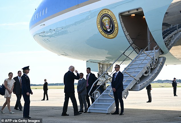 President Biden boards Air Force One Wednesday at Joint Base Andrews. His grandaughter Finnegan (left) followed him onto the plane. Other Biden family members weren't photographed on the tarmac