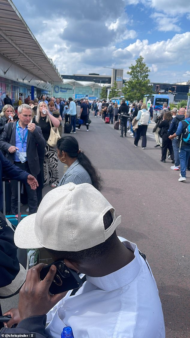 Huge lines have been seen outside the terminal, snaking around the side of the building