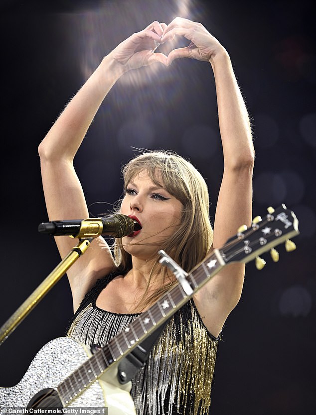 Taylor performing at her first of three Liverpool shows for the Eras Tour