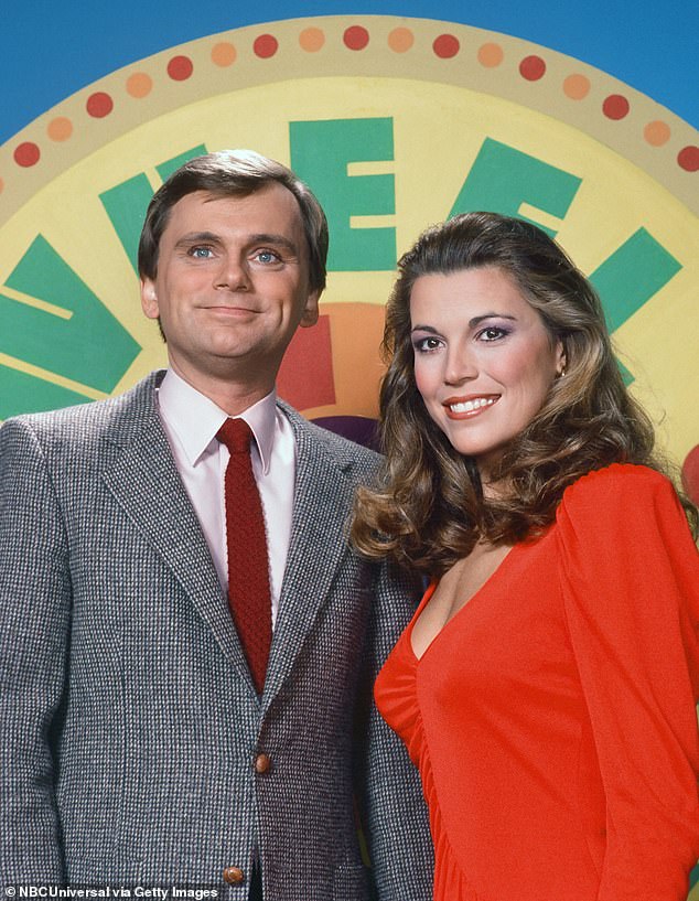 White, pictured with Sajak, 77, on season 10, 'wants to walk away sooner' than 2026 when her contract is up as she is finding it 'difficult' without him