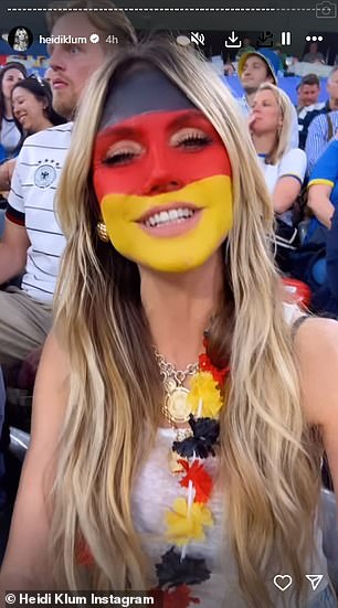 During the game, she shared more videos of herself and Kaulitz in the stands as he cheered and chanted for Germany