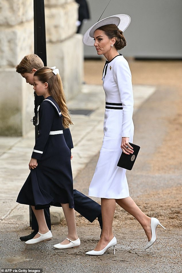 Kate arrives with Princess Charlotte and Prince George at Horse Guards Parade today
