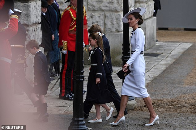 Kate arrives at Horse Guards Parade today as Trooping the Colour takes place