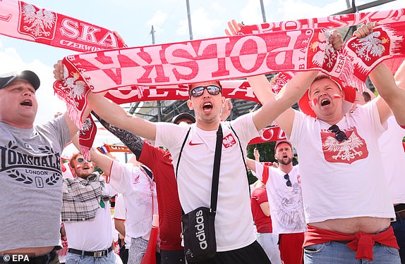 epa11414844 Poland supporters cheer outside the venue ahead of the UEFA EURO 2024 group D soccer match between Poland and the Netherlands, in Hamburg, Germany, 16 June 2024.  EPA/Leszek Szymanski POLAND OUT