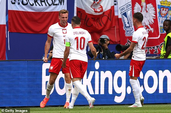 HAMBURG, GERMANY - JUNE 16: Adam Buksa of Poland celebrates after scoring during the UEFA EURO 2024 group stage match between Poland and Netherlands at Volksparkstadion on June 16, 2024 in Hamburg, Germany. (Photo by Maryam Majd/Getty Images)