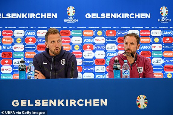 GELSENKIRCHEN, GERMANY - JUNE 15: Harry Kane of England and Gareth Southgate, Head Coach of England, speak to the media during an England Press Conference at Arena AufSchalke on June 15, 2024 in Gelsenkirchen, Germany. (Photo by Frederic Scheidemann - UEFA/UEFA via Getty Images)