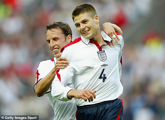 Steven Gerrard of England celebrates...LEICESTER, ENGLAND - JUNE 3:  Steven Gerrard of England celebrates with Gareth Southgate after scoring the opening goal during the International Friendly match between England and Serbia and Montenegro on June 3, 2003 in Leicester, England. Final score England 2 Serbia-Montengro 1.(Photo by Laurence Griffiths/Getty Images)...SL...FOI...Leicester...Great Britain