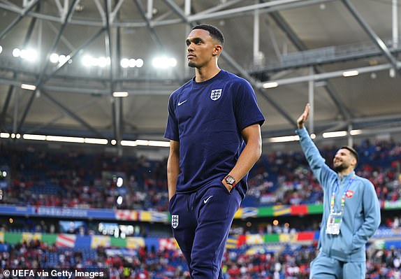 GELSENKIRCHEN, GERMANY - JUNE 16: Trent Alexander-Arnold of England inspects the pitch prior to the UEFA EURO 2024 group stage match between Serbia and England at Arena AufSchalke on June 16, 2024 in Gelsenkirchen, Germany.   (Photo by Michael Regan - UEFA/UEFA via Getty Images)