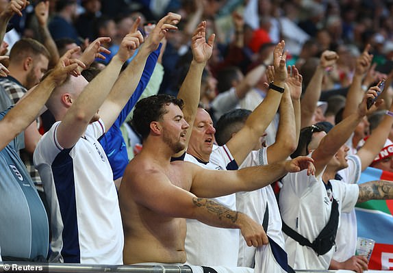 Soccer Football - Euro 2024 - Group C - Serbia v England - Arena AufSchalke, Gelsenkirchen, Germany - June 16, 2024 England fans react in the stands before the match REUTERS/Kai Pfaffenbach