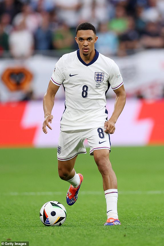 GELSENKIRCHEN, GERMANY - JUNE 16: Trent Alexander-Arnold of England runs with the ball during the UEFA EURO 2024 group stage match between Serbia and England at Arena AufSchalke on June 16, 2024 in Gelsenkirchen, Germany.   (Photo by Lars Baron/Getty Images)