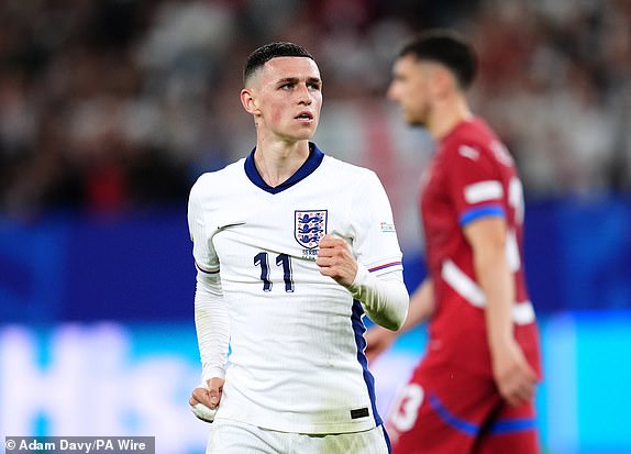 England's Phil Foden celebrates at the end of the UEFA Euro 2024 Group C match at the Arena AufSchalke in Gelsenkirchen, Germany. Picture date: Sunday June 16, 2024. PA Photo. See PA Story SOCCER England. Photo credit should read: Adam Davy/PA Wire.RESTRICTIONS: Use subject to FA restrictions. Editorial use only. Commercial use only with prior written consent of the FA. No editing except cropping.