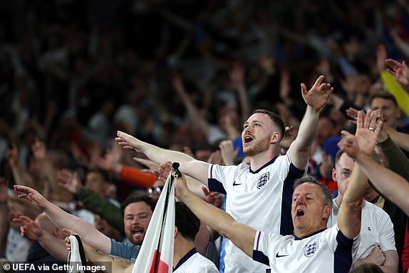 GELSENKIRCHEN, GERMANY - JUNE 16: A fans of England celebrates victory after the UEFA EURO 2024 group stage match between Serbia and England at Arena AufSchalke on June 16, 2024 in Gelsenkirchen, Germany.   (Photo by Christopher Lee - UEFA/UEFA via Getty Images)