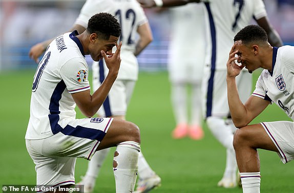 GELSENKIRCHEN, GERMANY - JUNE 16: Jude Bellingham of England celebrates scoring his team's first goal with teammate Trent Alexander-Arnold during the UEFA EURO 2024 group stage match between Serbia and England at Arena AufSchalke on June 16, 2024 in Gelsenkirchen, Germany.   (Photo by Eddie Keogh - The FA/The FA via Getty Images)