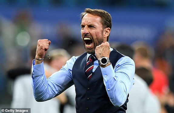 VOLGOGRAD, RUSSIA - JUNE 18:  Gareth Southgate, Manager of England celebrates victory following  the 2018 FIFA World Cup Russia group G match between Tunisia and England at Volgograd Arena on June 18, 2018 in Volgograd, Russia.  England won the game 2-1.(Photo by Matthias Hangst/Getty Images)