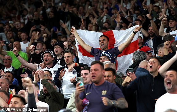 GELSENKIRCHEN, GERMANY - JUNE 16: Fans of England show their support at full-time following the team's victory in the UEFA EURO 2024 group stage match between Serbia and England at Arena AufSchalke on June 16, 2024 in Gelsenkirchen, Germany.   (Photo by Christopher Lee - UEFA/UEFA via Getty Images)