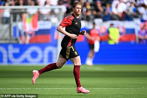 Belgium's midfielder #07 Kevin De Bruyne warms up before the start of the UEFA Euro 2024 Group E football match between Belgium and Slovakia at the Frankfurt Arena in Frankfurt am Main on June 17, 2024. (Photo by Kirill KUDRYAVTSEV / AFP) (Photo by KIRILL KUDRYAVTSEV/AFP via Getty Images)