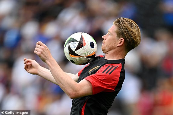 FRANKFURT AM MAIN, GERMANY - JUNE 17: Kevin De Bruyne of Belgium controls the ball as he warms up prior to the UEFA EURO 2024 group stage match between Belgium and Slovakia at Frankfurt Arena on June 17, 2024 in Frankfurt am Main, Germany. (Photo by Stu Forster/Getty Images)