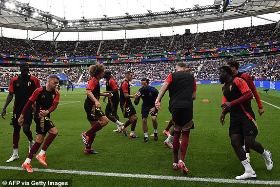 Belgium's players warm up ahead of the UEFA Euro 2024 Group E football match between Belgium and Slovakia at the Frankfurt Arena in Frankfurt am Main on June 17, 2024. (Photo by Thomas KIENZLE / AFP) (Photo by THOMAS KIENZLE/AFP via Getty Images)