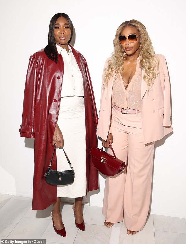 Serena Williams looked glamorous in a powder pink trouser-suit and matching lace shirt, partially unbuttoned to reveal her cleavage, as she joined Venus at the event