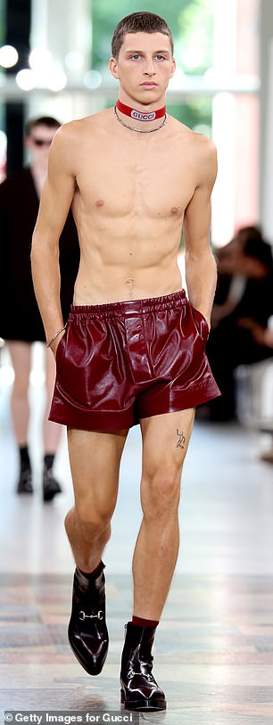 ... to leather shorts and little else on show