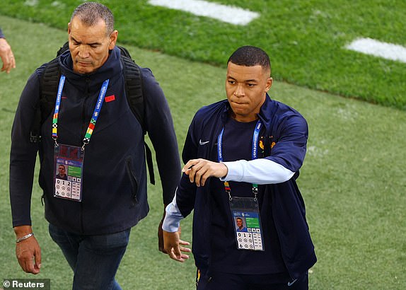 Soccer Football - Euro 2024 - Group D - Austria v France - Dusseldorf Arena, Dusseldorf, Germany - June 17, 2024 France's Kylian Mbappe on the pitch before the match REUTERS/Bernadett Szabo