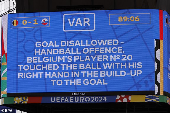 epa11418483 An electronic display shows the VAR decision during the UEFA EURO 2024 group E match between Belgium and Slovakia, in Frankfurt Main, Germany, 17 June 2024.  EPA/ROBERT GHEMENT