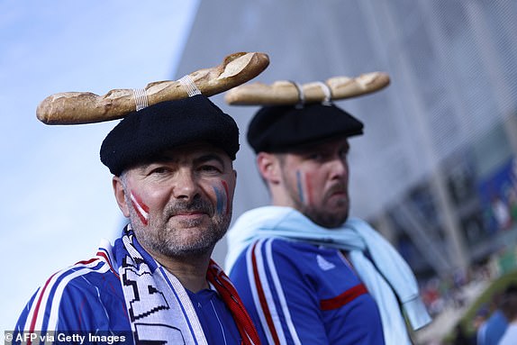 Sopporters of France pose ahead of the UEFA Euro 2024 Group D football match between Austria and France at the Duesseldorf Arena in Duesseldorf on June 17, 2024. (Photo by KENZO TRIBOUILLARD / AFP) (Photo by KENZO TRIBOUILLARD/AFP via Getty Images)