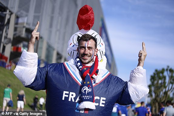 A France supporter poses ahead of the UEFA Euro 2024 Group D football match between Austria and France at the Duesseldorf Arena in Duesseldorf on June 17, 2024. (Photo by KENZO TRIBOUILLARD / AFP) (Photo by KENZO TRIBOUILLARD/AFP via Getty Images)