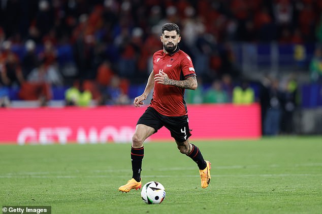 Albania defender Elseid Hysaj has issued an apology for 'ducking' out the way of Italy's second goal