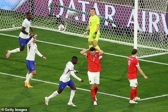 DUSSELDORF, GERMANY - JUNE 17: Maximilian Woeber of Austria reacts after conceding an own goal after deflecting a cross from Kylian Mbappe of France (not pictured) during the UEFA EURO 2024 group stage match between Austria and France at DÃ¼sseldorf Arena on June 17, 2024 in Dusseldorf, Germany. (Photo by Lars Baron/Getty Images)