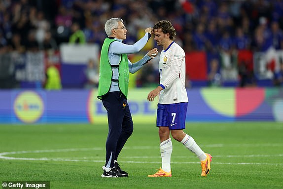 DUSSELDORF, GERMANY - JUNE 17: Antoine Griezmann of France receives medical treatment during the UEFA EURO 2024 group stage match between Austria and France at DÃ¼sseldorf Arena on June 17, 2024 in Dusseldorf, Germany. (Photo by Kevin C. Cox/Getty Images)