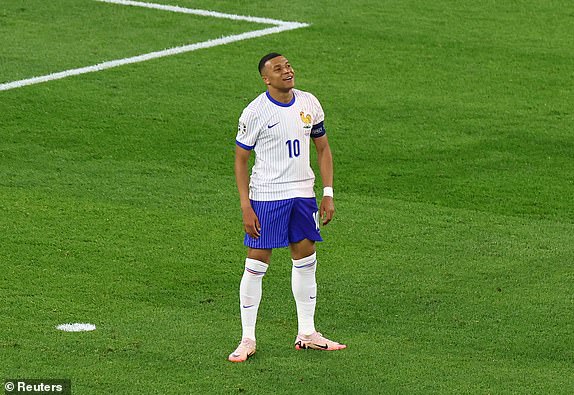 Soccer Football - Euro 2024 - Group D - Austria v France - Dusseldorf Arena, Dusseldorf, Germany - June 17, 2024 France's Kylian Mbappe reacts REUTERS/Bernadett Szabo