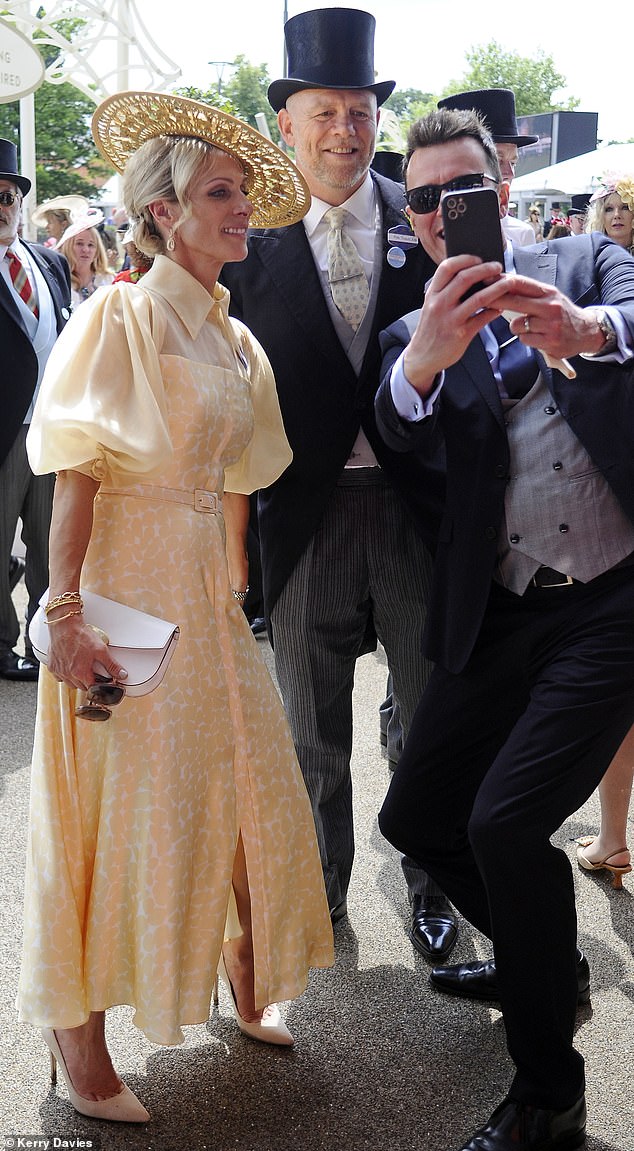 SAY CHEESE! Zara and Mike Tindall (pictured) were seen posing for a selfie with another Ascot attendee