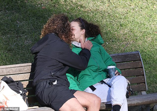 The former Bachelor star, 28, and Peking Duk frontman packed on the PDA as they took their dogs for a stroll