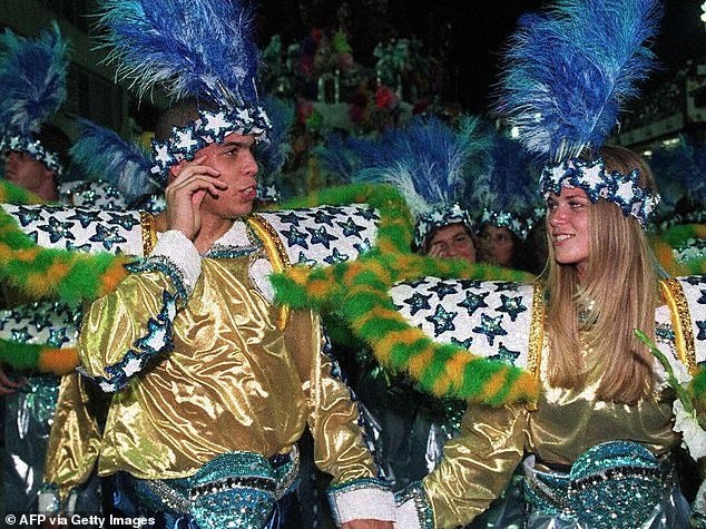 'Il Fenomeno' dances the samba with his then girlfriend Suzana Werner in Rio de Janeiro