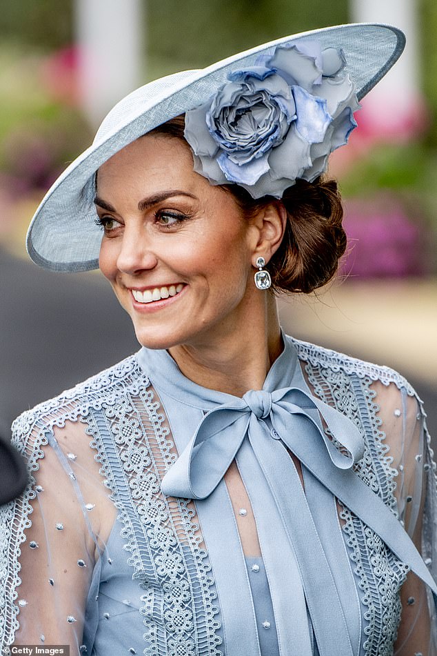 The Princess of Wales completed her elegant outfit with a striking floral hat from London-based brand Philip Treacy