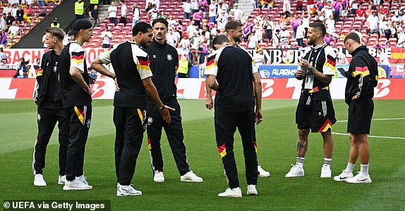 STUTTGART, GERMANY - JUNE 19: The players of Germany inspect the pitch to the UEFA EURO 2024 group stage match between Germany and Hungary at Stuttgart Arena on June 19, 2024 in Stuttgart, Germany. (Photo by Chris Ricco - UEFA/UEFA via Getty Images)