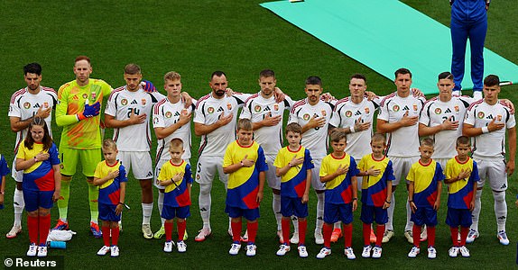 Soccer Football - Euro 2024 - Group A - Germany v Hungary - Stuttgart Arena, Stuttgart, Germany - June 19, 2024 Hungary line up during the national anthems before the match REUTERS/Leonhard Simon