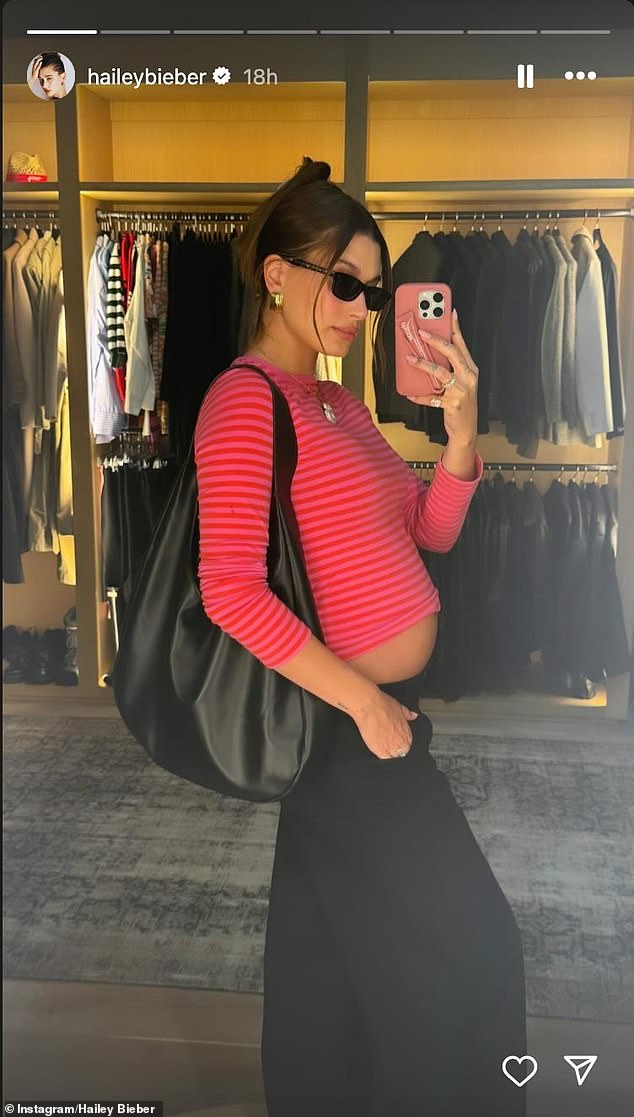 Expecting mom Hailey Bieber has been flaunting her belly in crop tops and low slung pants since announcing her pregnancy