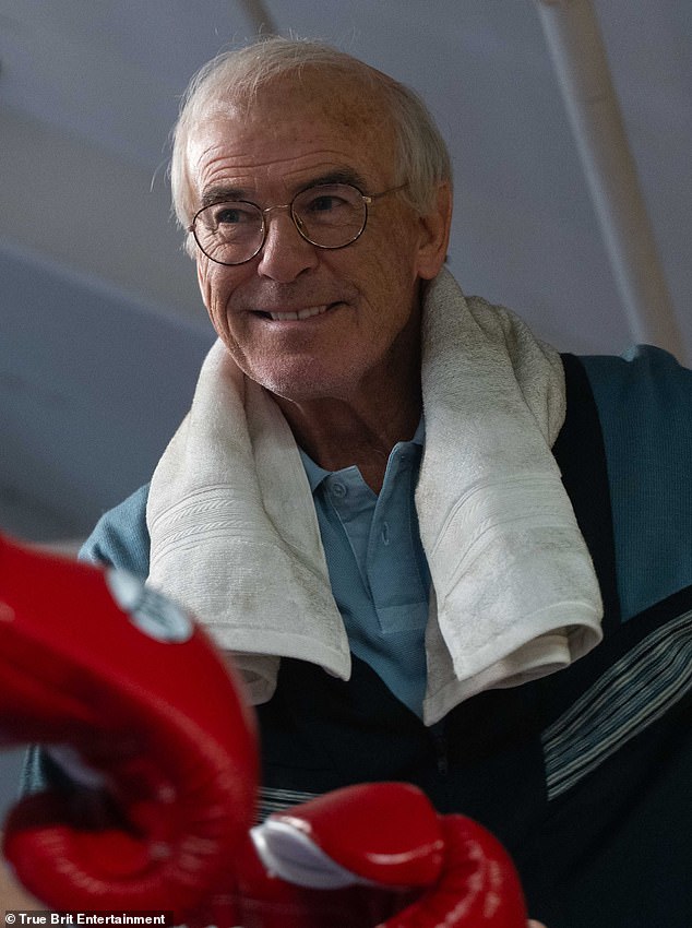 Pierce has been busy filming for Prince Naseem Hamed's upcoming biopic, Giant, as boxing trainer Brendan Ingle over in the UK (pictured in the film)