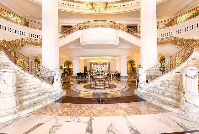 Make a grand entrance: Indulge in luxury from the moment you step foot in the Al Habtoor Palace lobby (pictured)