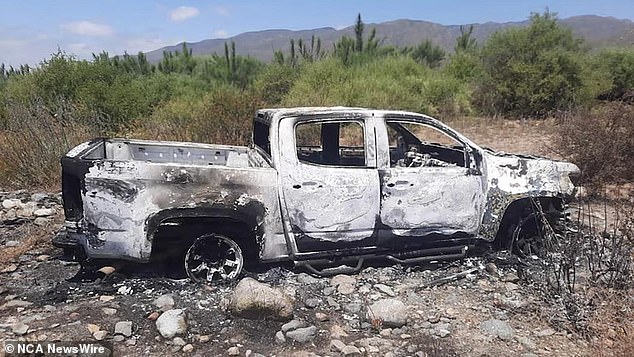 A burnt out car which was believed to have belonged to the trio was found by local police