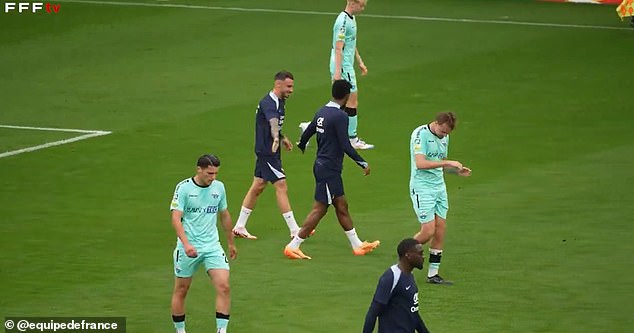 Kingsley Coman (centre) is congratulated after his long-range effort was deflected in